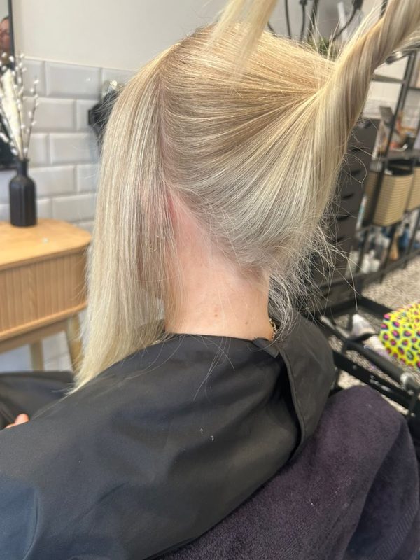 Pale blonde, lifted to show the colour at the nape, by Ellie