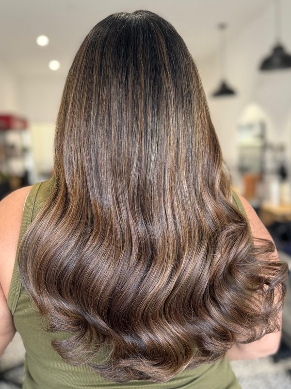Rich brunette with soft caramel waves, by Michelle